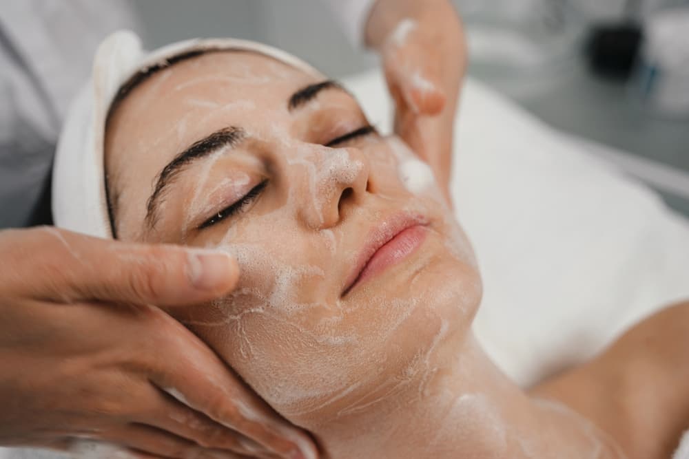Relaxing facial treatment with cleansing foam at The Zen Den, Glasgow.