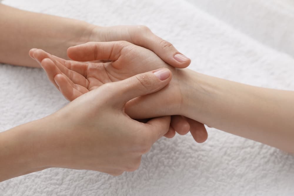 Hand or foot therapy at The Zen Den, a calming massage treatment designed to soothe tired muscles, improve circulation, and restore comfort.
