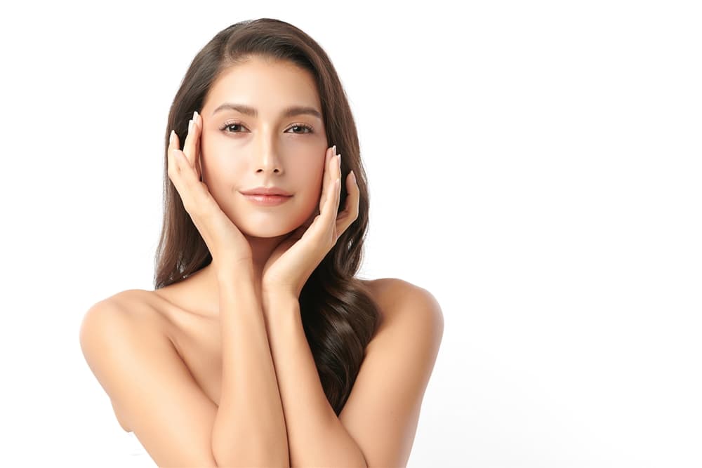 A woman with smooth, lifted skin after a Hydradermie Lift facial at The Zen Den, designed to tone facial muscles and restore youthful contours.