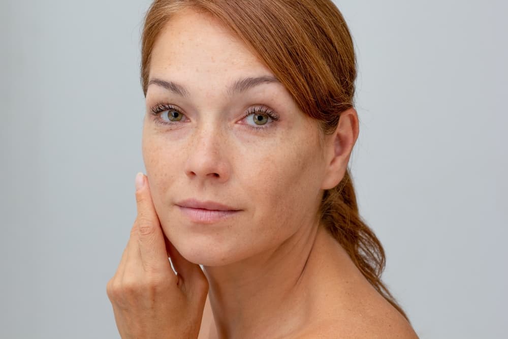A woman with healthy, natural skin after the HydrO2 Time Defence Plus facial at The Zen Den, a powerful anti-ageing treatment that smooths and firms.